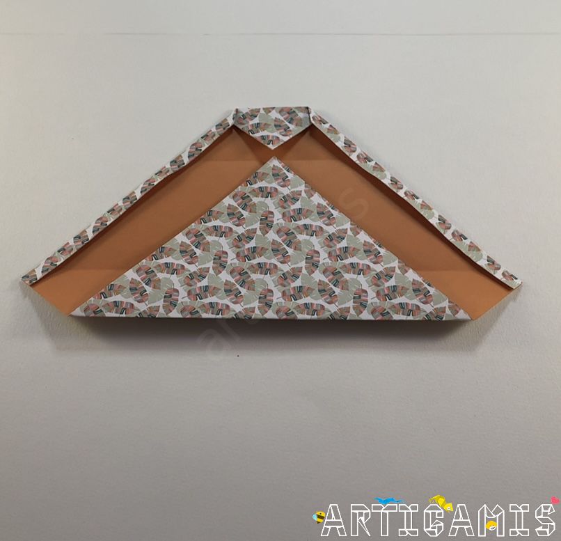Step 7: Bend the tip from bottom to top so that it touches the tip at the top.